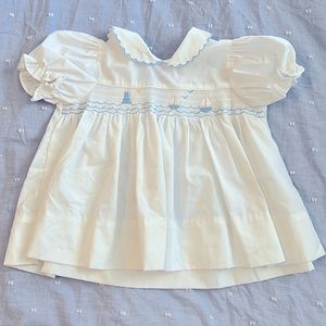 Adorable vintage baby girl smocked sailboat lighthouse dress.